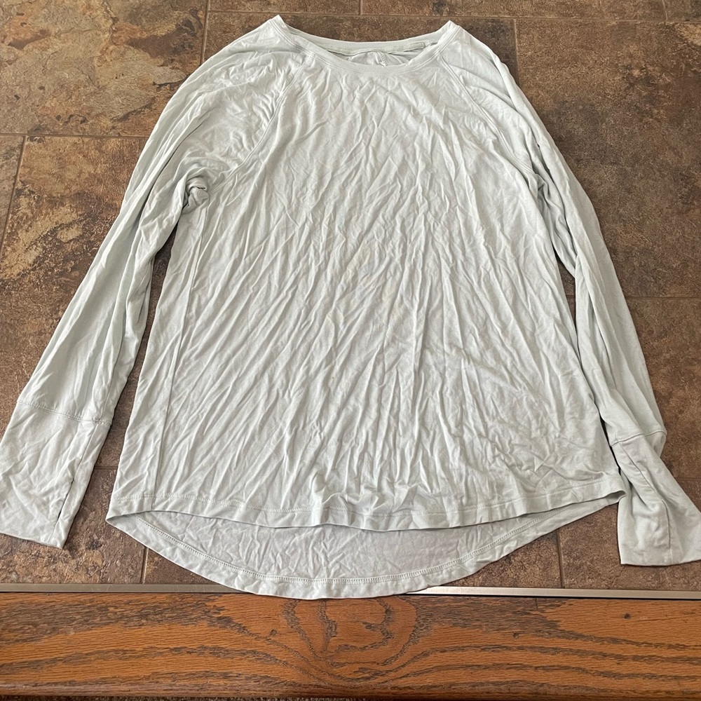 light teal long sleeve with thumb holes